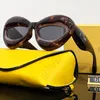 Luxe designer zonnebril Men Men Dames Zonnebril Glazen Klassiek Merk Luxe zonnebril Mode UV400 Goggle With Box Frame Travel Beach Top Level