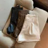 Pantaloncini da donna Tasche laterali moda chic da donna Ecopelle nera Pantaloni corti da donna vintage con cerniera a vita alta Mujer PU Y2k Sexy