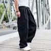 Męskie spodnie modne luźne luźne ładunki mężczyźni swobodny hiphop harem bawełniane proste spodnie szerokie noga ubrania streetwearne plus size