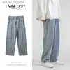 Jeans pour hommes Mode coréenne hommes Baggy jean classique tout-match couleur unie jambe droite Denim pantalon large mâle bleu clair gris noir L230921