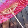 傘の結婚式の赤い油を塗った紙傘hanfu女性中国語スタイルの絹の装飾パラソルパラガスソンブリラ230920