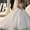 2023 Glitter Dubai Arabia Ball Gown Abiti da sposa Maniche lunghe Perline Appliqued in pizzo Plus Size Abiti da sposa su misura Cristallo R2515