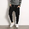 Mäns byxor män korsar avslappnad elastisk bomullsherr koreansk mode baggy mager sweatpants byxor jogger blyerts stor storlek 5x