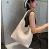 Handheld tas Jodie handwoven tas voor vrouwen 2024 Hoge capaciteit TOTE BABY MOEDER KABBAGE BAMK WATERMAKT Embique Straddle