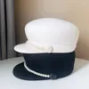 Berets 202309-YY Ins Chic Gota Inverno Lã Feltro Pérola Pu Botão Senhora Octogonal Chapéu Mulheres Viseiras Cap Atacado