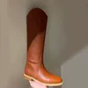 Brown leather Kate Chateau 30 boots featuring round toe panelled design tonal stitching pull-on style and low block heel women luxury designer shoes factory footwear