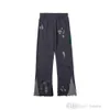 Designer Sweatpants Cotton Sportswear Pants Mens Letter Hand Painted Ink Splashing Stitched And Women High Street Drawstring Baggy Trousers