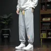 Męskie spodnie odzieży swobodne spodnie dresowe spodnie sznurki sportowe jogger na siłownię dresy uliczne harem plus size 7xl 8xl