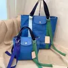 2024 Contraste Nylon Bolsas de cosméticos Casos Diseñador Tote Cinta Lienzo Pequeño Bolso Lindo Casual Mujeres Hobo Bag