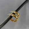 Women's designer earring brass plated 14K gold Fried Dough Twists c-type metal earrings