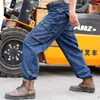 Jeans da uomo Pantaloni di assicurazione sul lavoro Lavoro da uomo Saldatori Antiscottatura Tuta multitasche resistente all'usura Jeans per riparazione auto L230921