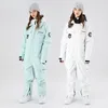 Ternos de esqui terno de esqui impermeável e respirável calças de snowboard jaqueta mulheres homens roupas de neve inverno workwear 230920