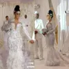 Modest Mermaid Wedding Dresses Jewel Neck manga comprida Tulle Lace Applique Crystal Feather Vestidos de casamento Sweep Train robe de mariee331R