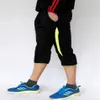 2018 pantalones de entrenamiento de fútbol para hombres joggings fútbol recortado 3 4 pantalones hombres deportes correr fitness pantalones bolsillo pantalones de chándal 221c