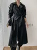 Mélanges de laine pour femmes Mode Long Trench-Coat pour Femmes Rétro 2023 Automne Nouvelle Mince Veste En Cuir PU Lâche Solide En Cuir Trench-Coat Noir Long Manteau J230922