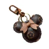 Designer keychain bear head leather fur ball pendant key chain bow car pendant metal fashion personality creative cute nice242N