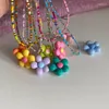 Collane con ciondolo Collana di fiori con perline colorate Gioielli al collo di moda Perline in materiale acrilico per ragazze