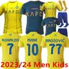 2023/24 Nassr Soccer Jerseys 2023 2024 Accueil jaune loin CR7 Gonzalo Mane Martinez Talisca femmes FANS hommes enfants Football shiirt costume Al-Nassr