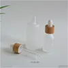 Packaging Bottles Wholesale 5Ml 15Ml 30Ml 50Ml 100Ml Frosted Glass Essential Oil Dropper With Natural Bamboo Caps Empty Cosmetic Dro Dhmv6