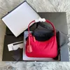 Kvällspåsar nylon mini handväskor modedesigner axelväskor högkvalitativ koppling som håller handväska lyx retro plånbok kvinnor reser hobo aftonväska rosa väskor x092