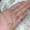 Klucz zamka z literą kwiatową Naszyjnik Kobiety Złoty Złoty Swater Naszyjniki Masowe Biżuter
