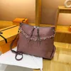 Kvällspåsar Fashion Chain Bucket Bag 2023 Ny PU -läder präglade Joker damer axel crossbody väska lyxdesigner messenger väska 8238 x0922