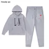 Designer Mens Survêtements Pull Pantalon Set Basketball Streetwear Sweatshirts Costume de sport Vêtements de marque pour les amoureux Lady Track Suit Sweat à capuche et manches de pantalon