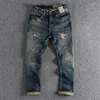 Jeans da uomo Denim con cimosa per abbigliamento da uomo Fori rattoppati Pantaloni cargo lavati retrò Pantaloni arrotolati effetto consumato Abbigliamento casual Oversize