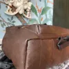 Sac de designer pour hommes Sac à dos en cuir pour femmes Style de voyage Sacs de messager Mode Sac à main en cuir Grande capacité Bandoulière d'alpinisme