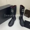 مصمم أمطار أحذية النساء أحذية PVC أحذية أسود Rev Rubber Boot Fashion المظهر المظهر المظهر المظهر المظهر الأعلى