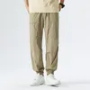 Jeans pour hommes pantalons d'été mince soie de glace décontracté marque à la mode séchage rapide respirant sport leggings recadrée