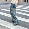 Męskie dżinsy Niewiele lat jesienna zima zużyta uszkodzone swobodne luźne spodnie na nogawki vintage streetwear męskie spodnie 24x1727 230922