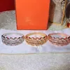 Bangle Designer Personalizowany nos inkrustowany diamentowy diamentowy multi -warstwowy bransoletka rękodzieła dla damskiej mody Zaawansowana sieć sensowna czerwona rękodzieła 7BNB