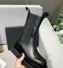 Botas altas de diseñador, botas de marca de alta calidad, tacón de cuero, zapatos de cuero Martin, botines con cremallera de fondo plano para mujer