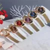 Reloj de pulsera de cuarzo estilo hebilla magnética banda de acero de Metal estilo flor rosa para mujer marca de moda Di09296K