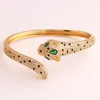 Bracciale europeo e americano delicato leopardo aperto braccialetti femminile placcato oro 18 carati micro-intarsiato braccialetto zircone nero per donna uomo 230923
