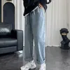 Jeans da uomo Pantaloni in denim azzurro Pantaloni streetwear Vestibilità dritta ampia Gamba larga con cerniera a bottone a vita media