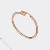 Bracciale di design Bracciale rigido Gioielli per unghie per donna Acciaio al titanio placcato oro Non sbiadisce mai Oro anallergico/argento/oro rosa; Negozio/21621802 8ehk 08hb