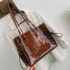 DrawString 2019 Handväskor Kvinnor Väskor Tote stor kapacitet Bruna axelväskor Wild PVC Clear Transparent Bag Bolsas#H251