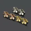 Boucles d'oreilles en titane et acier pour femmes, Style européen et américain, initiales gravées, trois diamants, fleur, Clip, 3 couleurs, 332o