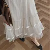 Kjolar franska mesh kjol design oregelbundna spetsar sömmar mid-längd a-line tunn saga kvinnor vårstil