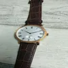 Montre classique Mouvement mécanique à vent à la main pour homme et femme, montre-bracelet en acier inoxydable, cadran blanc, bracelet en cuir256i