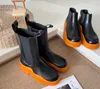 Mode Homme et Femme Automne et Hiver Bottes Courtes Nouveau Fond Épais Couple Style Mi Manches Côté Élastique Intérieur Renforcé Véritable Cuir Martin Bottes EU35-45