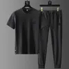 Herrspårar Summer Ice Silk Casual Sports Suit Herrens veckade tunna T -shirtbyxor Två stycken Set Men's High Quality Breattable Tracksuit 230922