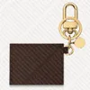 M69003 POUCH BAG CHARM PORTACHIAVI Designer Portamonete da donna Mini Portafoglio Pass Cover Custodia Anello Portachiavi Parti Pochette Dragonne255K