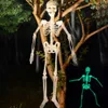 Andra evenemangsfestleveranser Scary Halloween Props Luminous Hanging Skeleton Home Outdoor Yard Garden Decoration Moverble Glow Fake Skull 230923