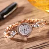 腕時計の高級ファッションローズゴールドステンレススチールの女性は、エレガントクォーツ腕時計を見るシンプルな小さなラウンドダイヤルレロジオフェミニノ