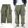 Herrbyxor multi-pocket safari stil haklapp overaller män hip hop streetwear last arbete overaller casual lös hängdräkt jumpsuit