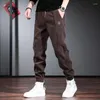 Pantalons pour hommes 2023 hiver velours côtelé peluche et épaissi décontracté noir tendance coupe ample disponible pour la vente en gros