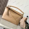 Fashion designer bag handbag high quality Genuine Leather Geometric designer makeup bag shoulder bag puzzle capacity zipper opening Adjustable shoulder strap